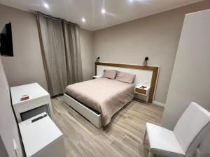 Postel nebo postele na pokoji v ubytování Matera in Centro Rooms