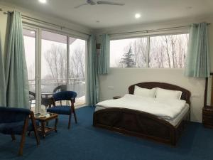 Postel nebo postele na pokoji v ubytování Sahil Lake View + 37 fotografií
