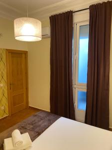 Postel nebo postele na pokoji v ubytování Hostal Oliver