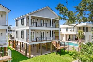 an exterior view of a house with a pool at Beach Retreat in Gulfport