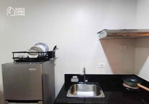 Η κουζίνα ή μικρή κουζίνα στο Studio apartment with balcony - Iloilo Condo Living +1 φωτογραφίες