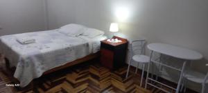 Postel nebo postele na pokoji v ubytování Lopez House