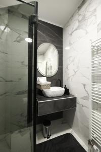 Ένα μπάνιο στο Central Point Apartmani, Banja Luka