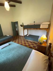 Postel nebo postele na pokoji v ubytování Madreselva Hostel