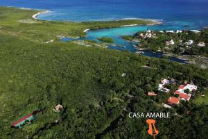 an aerial view of the island of cassisamine at Villa con piscina y acceso a laguna Yalku, Akumal in Akumal