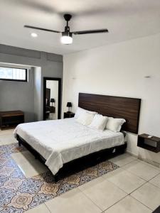 Postel nebo postele na pokoji v ubytování Apartamentos 31
