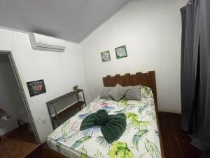 Postel nebo postele na pokoji v ubytování Uvita Pirates Hostel + 11 fotografií