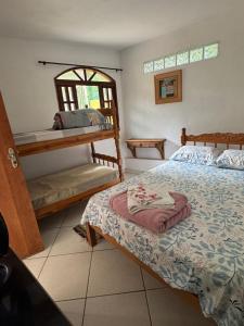 Cama ou camas em um quarto em Pousada do Sossego