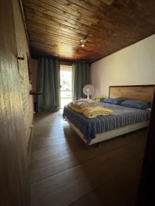 Cama ou camas em um quarto em Pousada do Sossego