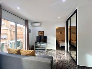 TV a/nebo společenská místnost v ubytování Apartamentos Playa