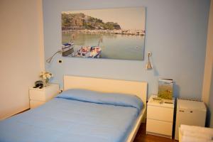 Postel nebo postele na pokoji v ubytování I Delfini