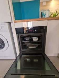 Η κουζίνα ή μικρή κουζίνα στο appartement vue mer,accès direct plage,fibre,clim,parking public gratuit