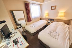 Cama o camas de una habitación en Hotel Astir Nagoya Sakae