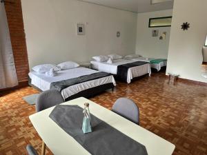 Postel nebo postele na pokoji v ubytování Hospedaje Rancho Guadalupe
