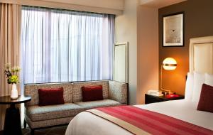 Postel nebo postele na pokoji v ubytování Hotel Commonwealth