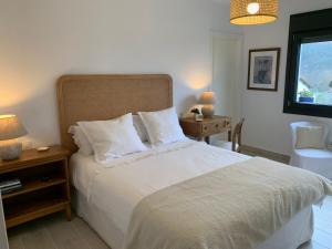 Кровать или кровати в номере Casa Paloma