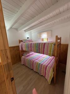 Cama ou camas em um quarto em Mirador Collico 3