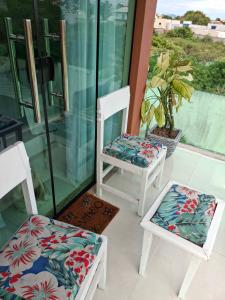 En balkon eller terrasse på Espaço de descanso e paz