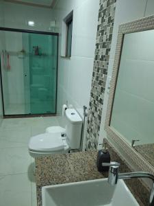 Et badeværelse på Espaço de descanso e paz + 5 billeder