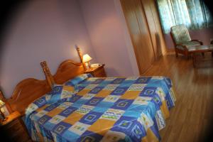 Postel nebo postele na pokoji v ubytování Hotel Las Nieves