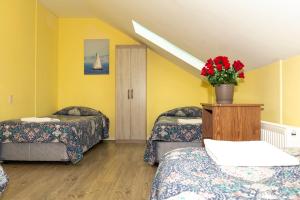 Voodi või voodid majutusasutuse Hostal Del Tuto toas