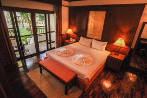 Katil atau katil-katil dalam bilik di Suan Bua Hotel & Resort