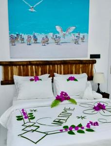 En eller flere senge i et værelse på Crystal sea inn + 229 billeder