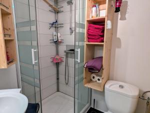 a small bathroom with a shower and a toilet at Maison de ville confortable proche nature, idéale pour 4 personnes - FR-1-589-772 in Raon-lʼÉtape +11 photos