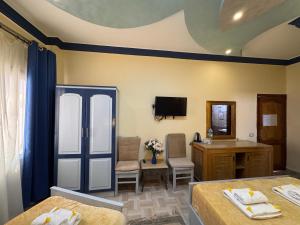 Postel nebo postele na pokoji v ubytování Sababa Hotel