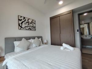 Postel nebo postele na pokoji v ubytování Agile Luxury Suite At TRX KLCC
