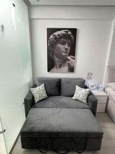 Area soggiorno di Modern Shared Studio in Heart of Zamalek