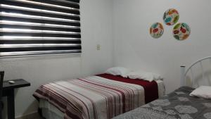 Krevet ili kreveti u jedinici u okviru objekta Stefanich Aparthotel 51