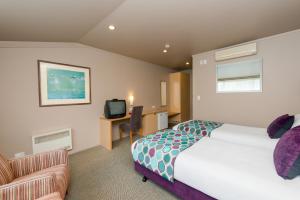 TV a/nebo společenská místnost v ubytování Heartland Hotel Fox Glacier + 22 fotografií