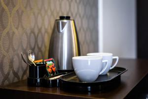 Príslušenstvo na prípravu kávy alebo čaju v ubytovaní Hotel Focus Centrum Konferencyjne