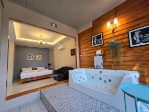 Postel nebo postele na pokoji v ubytování Krin Resort