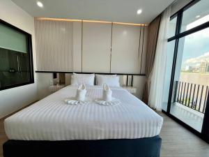 View khong Hotel โรงแรมวิวโขง客房内的一张或多张床位