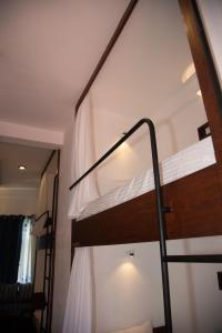 Postel nebo postele na pokoji v ubytování New Radiant Hostal
