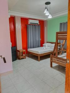 Postel nebo postele na pokoji v ubytování Woodland Inn