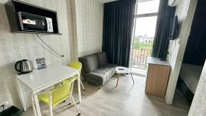 TV a/nebo společenská místnost v ubytování The Grand Jomtien Condo
