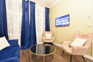 Гостиная зона в Rezidence Makart Apartment