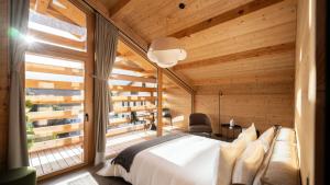 Postel nebo postele na pokoji v ubytování Boutique Hotel Casa Giovanoli