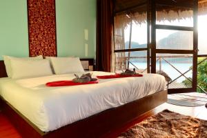 Letto o letti in una camera di Phi Phi Sea Sky Resort