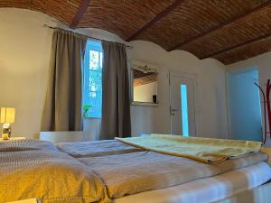 Posteľ alebo postele v izbe v ubytovaní Auern Apartement