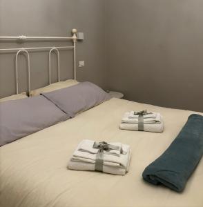 Ένα ή περισσότερα κρεβάτια σε δωμάτιο στο Aurora Apartment