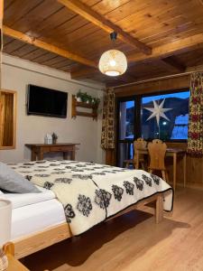 Posteľ alebo postele v izbe v ubytovaní Z Giewontem w Tle Apart&Room