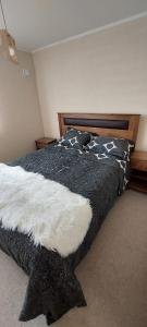 Postel nebo postele na pokoji v ubytování Arriendo departamento Villarrica