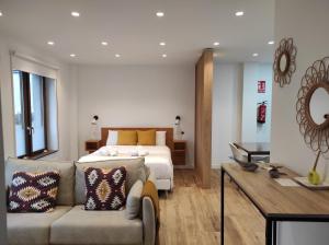 Postel nebo postele na pokoji v ubytování Apartamentos la Garita - El Taller - Cudillero