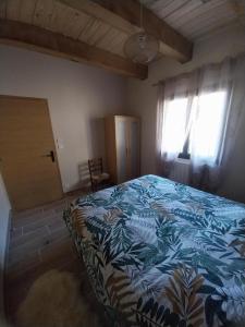 Gîte Au point de Vue 객실 침대