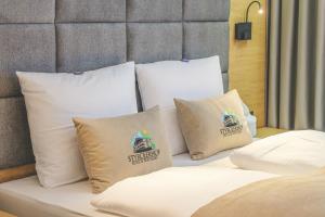 En eller flere senger på et rom på Hotel Styrolerhof