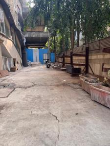 an empty street next to a building at Hotel West Line Andheri in Mumbai +35 photos